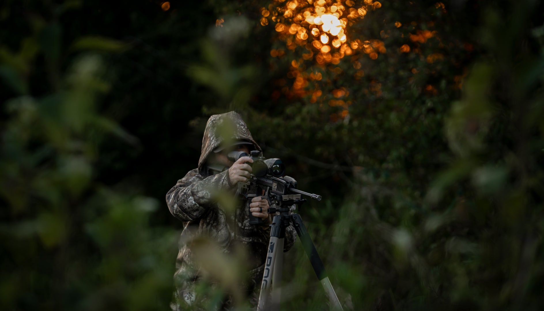 Hunter_with_tripod_sunset