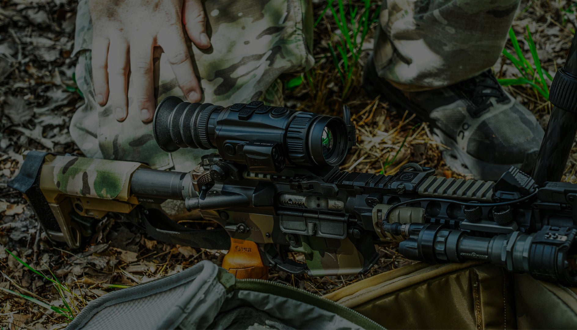 HUNTING RIFLE WITH MOUNTED THERMAL SCOPE