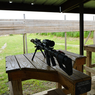 THERMAL OPTIC MOUNTED ON RIFLE AT SHOOTING RANGE
